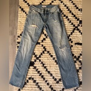 Distressed men’s Bullhead Dillon Skinny jeans.